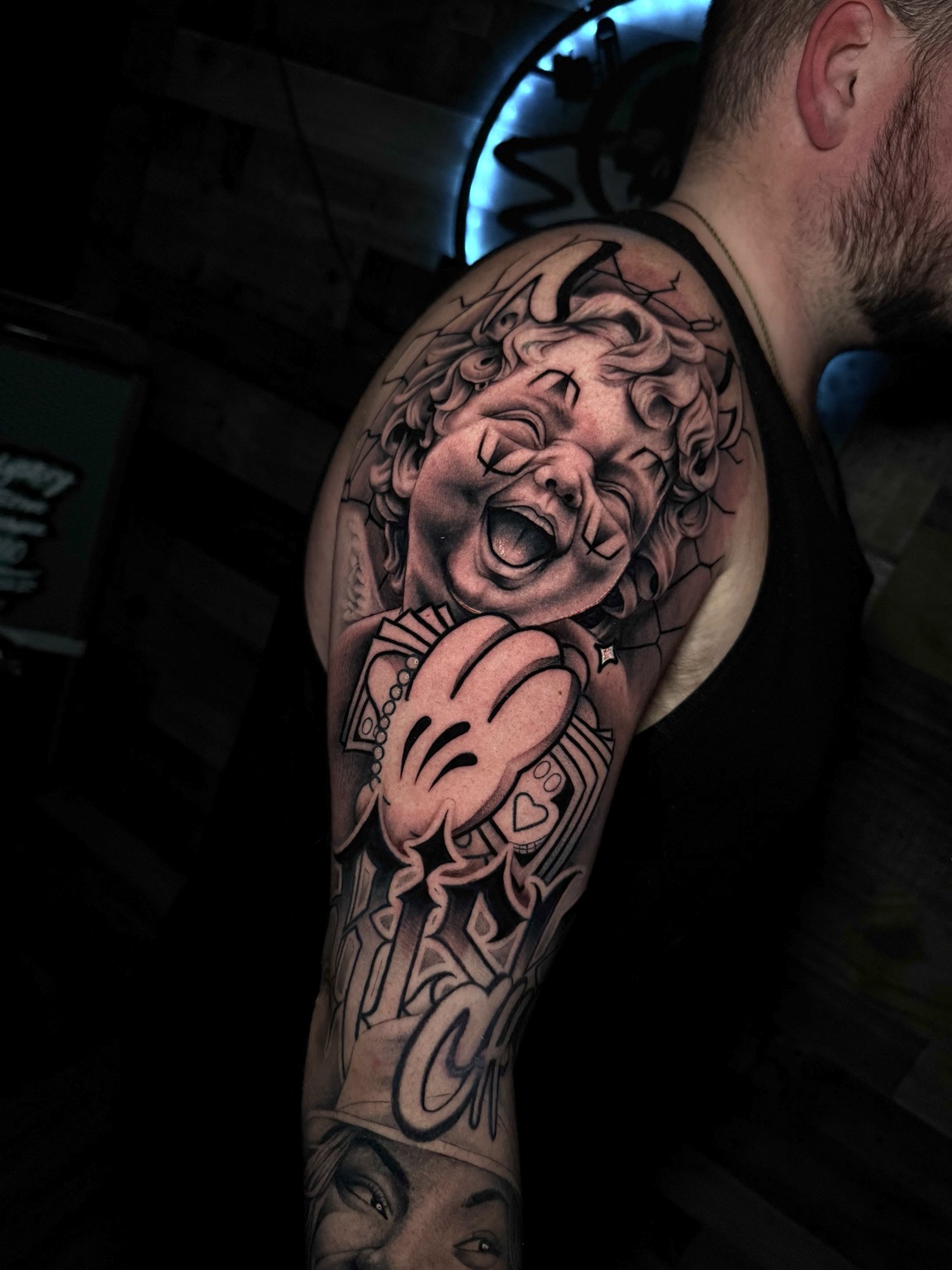 Detailed realism sleeve tattoo